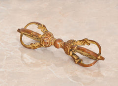 Brass small eight-pronged dorje with multicolor patina, side view