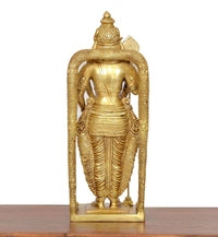 Brass Murugan statue back view with detailed drapery and long arched support