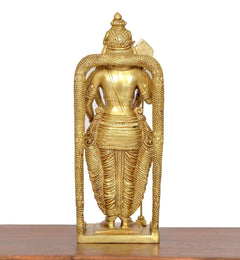 Brass Murugan statue back view with detailed drapery and long arched support