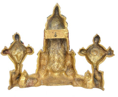 Back view of brass wall hanging showing Bala Ji with two side figures