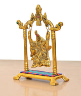 Golden Radha Krishna swing idol, side angle, colorful base trim