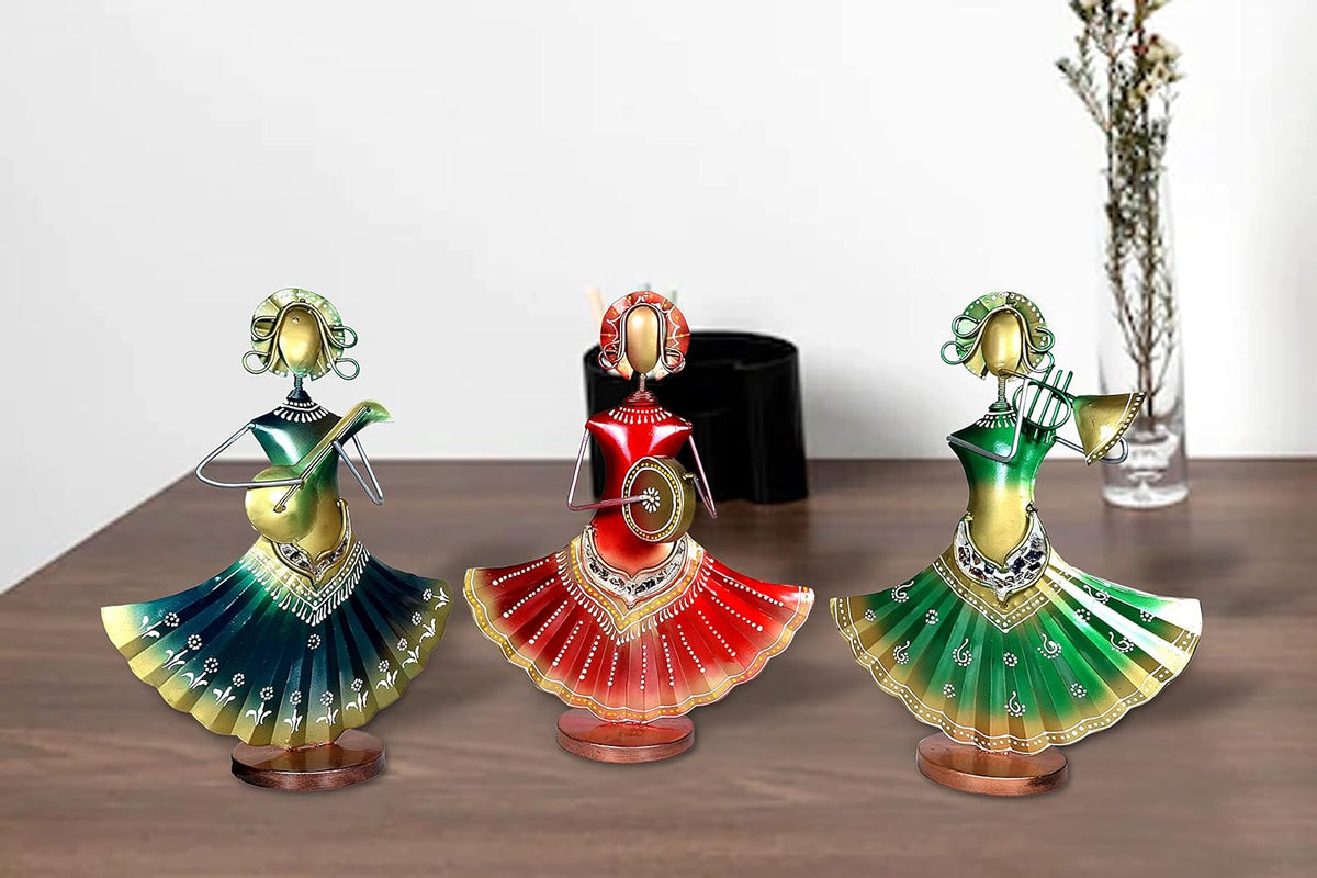 AONA iron folk musician figurines: red, green, and teal dressed performers with instruments