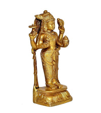 Golden brass Dhanvantri idol, angled view, raised arms with pot and staff
