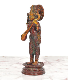 Maa Saraswati brass standing sculpture, side view with trident-like staff