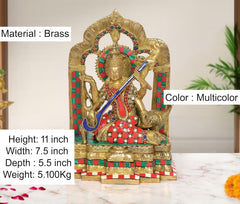 Maa Saraswati brass statue seated on ornate base, red dress, blue veena, multicolor accents