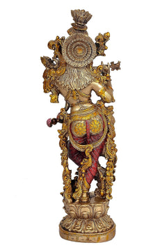 Resin Krishna flute showpiece, side/rear angle, ornate gold details, multicolor red skirt, base