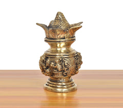 Brass kalash showpiece with carved deities on bulb base, gold finish