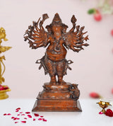 Brass Ganesha statue with 16 hands mudra, seated on ornate pedestal, bronze finish