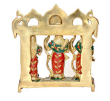Brass Ram Darbar statue, rear view showing inner deities within the arched frame