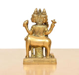 Rear view brass Trimurti idol, curved ornaments, raised arms, 4.5 in