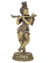 Gold-tone Lord Krishna statue playing flute, detailed crown and jewelry, round base