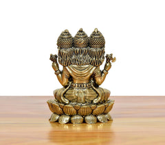 Brahma Ji brass idol back view, three crowns and textured detailing on lotus base
