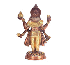 Brass Dhanwantri idol, back view with crown and ornaments, round pedestal base