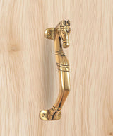 Golden brass horse head door pull handle with curved shaft and decorative etching