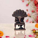 Copper Lakshmi Narasimha statue back view with textured canopy and pedestal base