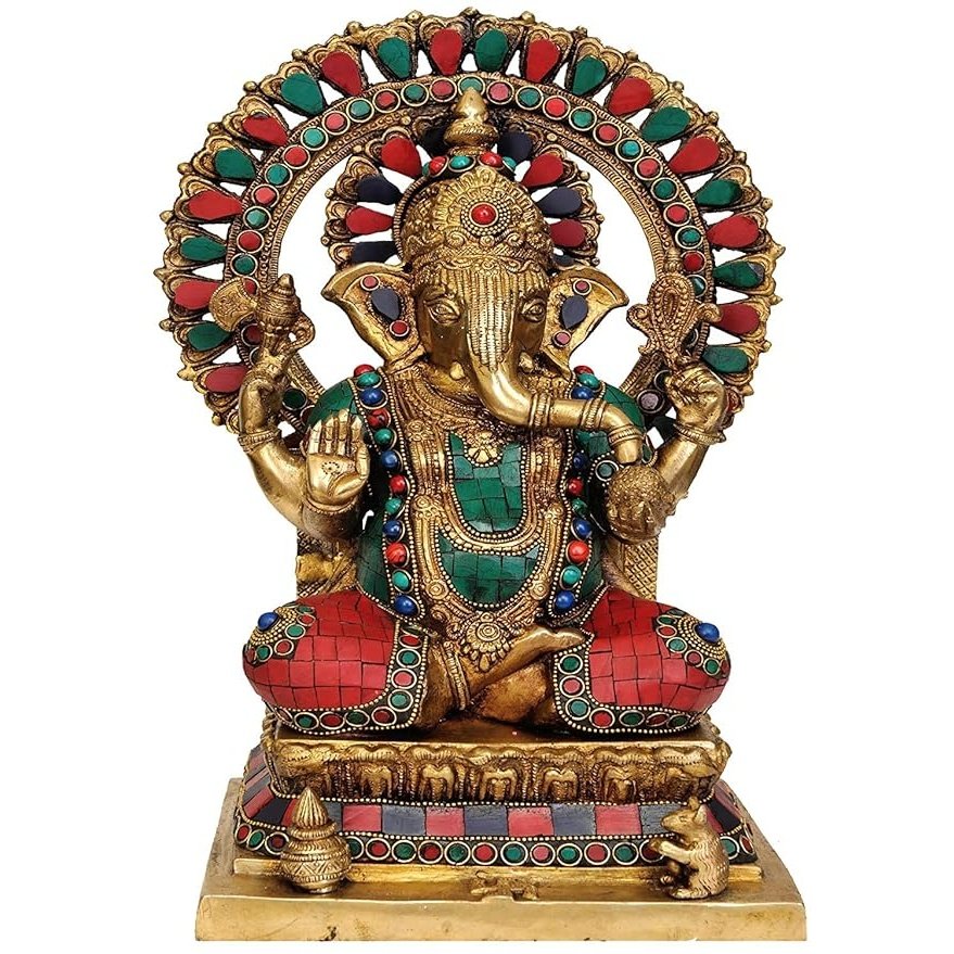 Brass Lord Ganesha idol, detailed headdress, seated on throne with colorful accents