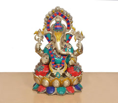 Brass Ganesha sitting on lotus, detailed crown and multicolor beadwork