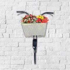 Iron wall hanging basket with cream mesh panel, black steel frame, and flower-filled bin