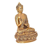 Brass Buddha statue, three-quarter view, palms together mudra, detailed engravings