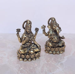 Brass Lakshmi & Ganesha idols, seated lotus design, front angled view