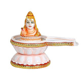 Resin Shiva Shivling figurine, front view: painted face on ling base with tray