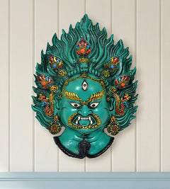Green resin Mahakal wall hanging mask with fierce face, flame-like hair and ornaments