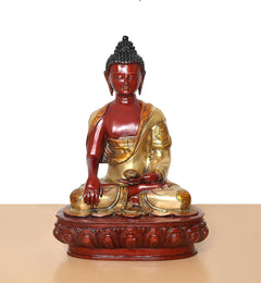Seated Buddha ornament with dark hair texture, red skin finish, gold robe details, on base