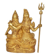 Brass Shiva and Parvati idol from rear angle, trident visible