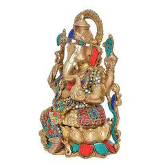Seated Brass Mangalkari Ganesh statue, gold finish with red, blue, teal details