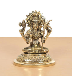 Golden Kamakshi Amman figurine, seated pose with detailed crown and halo on pedestal