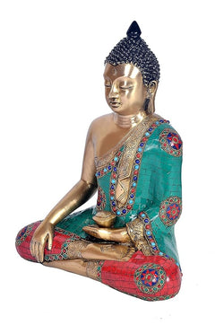 Brass Buddha statue seated in Bhumisparsha mudra, side view, teal and red mosaic