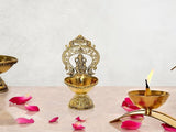 Gold fine brass Ganesh diya with flame, ornate base, 5.5 inch height