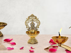 Gold fine brass Ganesh diya with flame, ornate base, 5.5 inch height
