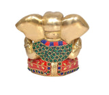 Back view brass Ganesha idol with gold ears and jeweled waist belt