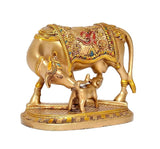 Golden resin cow figurine with calf, detailed painted saddle, pooja mandir decor