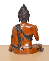 Rear view brass Buddha idol, seated cross-legged with draped robe and dot details
