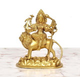 Durga Maa on lion brass statue, golden finish, side view with raised arms