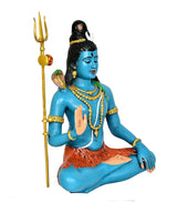 Blue Shiva sculpture with trident staff, orange patterned lower cloth, blessing hand raised