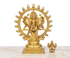 Brass Sudarshana Vishnu statue with Yoga Narasimha figure; small accessory shown beside