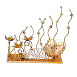 Metal reclining Buddha table ornament with ornate back medallion and lotus candle holders