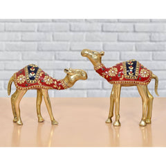 Brass camel figurine pair with red jeweled saddles, decorated neck and legs