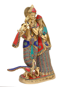 Brass Radha-Krishna idol with decorative robes; Krishna playing flute, peacock fan back