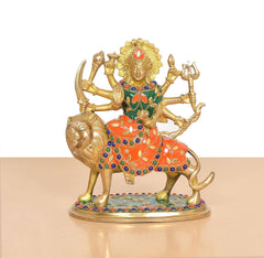 Durga Maa brass idol on lion, front view with orange dress and jewel dot trim
