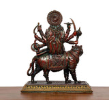 Superfine brass Durga Maa idol with spread-back hair texture on tiger mount, front view