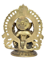 Brass Ganesha idol from behind, circular halo and back ornaments, seated on patterned base