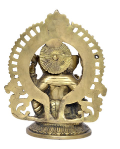 Brass Ganesha idol from behind, circular halo and back ornaments, seated on patterned base