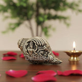 Brass Shankh figurine with embossed Vishnu, Laxmi and Shesh Naag design