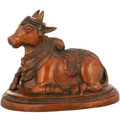 Brass Nandi bull statue with ornate engraved details and decorative collar
