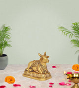 AONA brass seated Nandi bull statue on base for Shiv temple pooja, 3 inch height