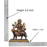 Durga Maa brass idol on tiger, shown next to height measuring scale, ornate details